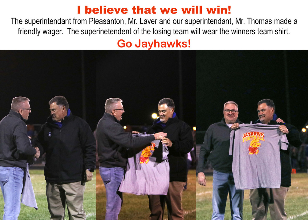 Mr. Thomas giving Mr. Laver his Jayhawk shirt